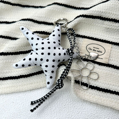 Vintage Canvas Bag Charm with Five-Pointed Star.Add a touch of retro charm to your everyday carry with this stylish fabric bag accessory