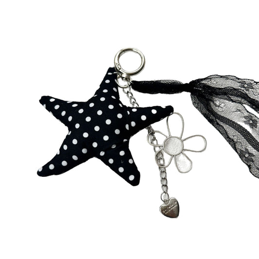 Vintage Canvas Bag Charm with Five-Pointed Star.Add a touch of retro charm to your everyday carry with this stylish fabric bag accessory
