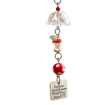 Red Apple Core Wind Chime Pendant Bring natural charm to your space with this delicate red apple core wind chime pendant