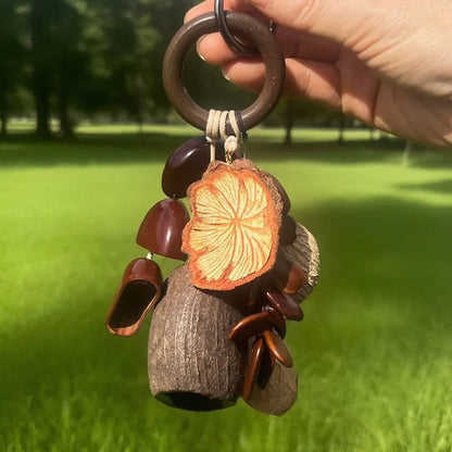 Forest-Inspired Handmade Nutshell Wind Chime Bag Charm Bring natural elegance to your everyday carry with this enchanting handmade bag charm