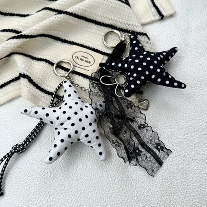 Vintage Canvas Bag Charm with Five-Pointed Star.Add a touch of retro charm to your everyday carry with this stylish fabric bag accessory